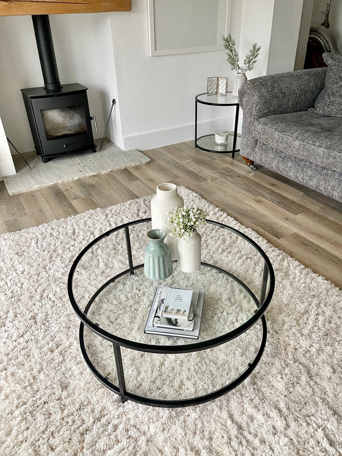 circular coffee table styled in a living room