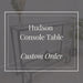 Hudson Console Table with text overlay on a dark background