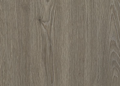 Close-up of a wooden surface with a grayish-brown color and visible grain pattern.