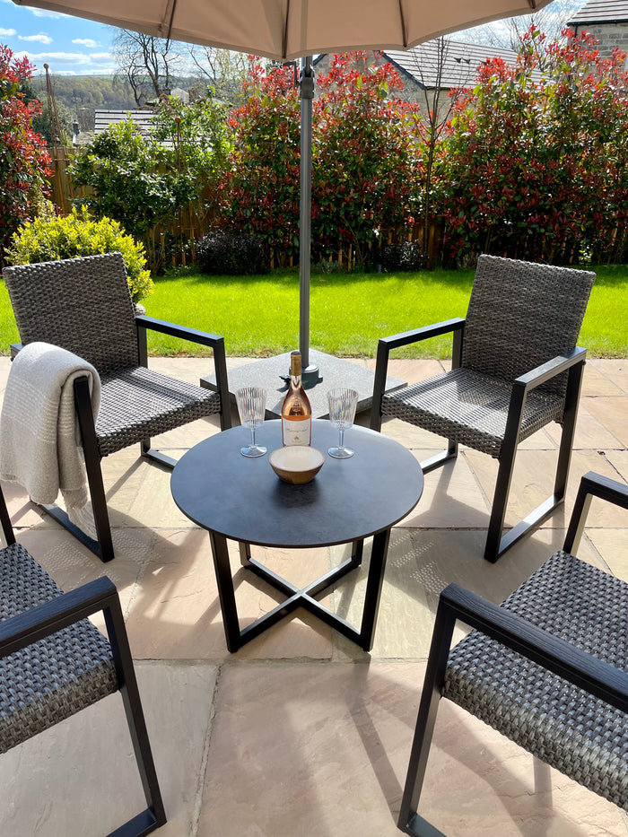 small handmade round outdoor table