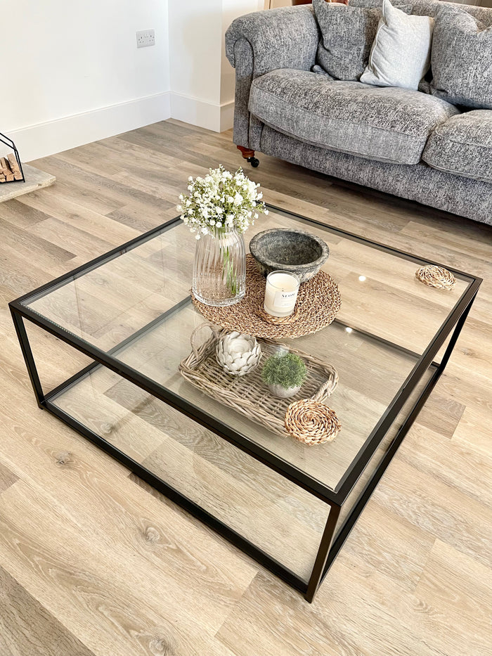 black metal frame and glass styled coffee table