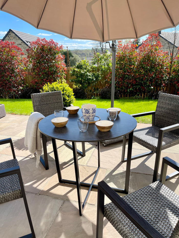 circular handmade outdoor metal dining table