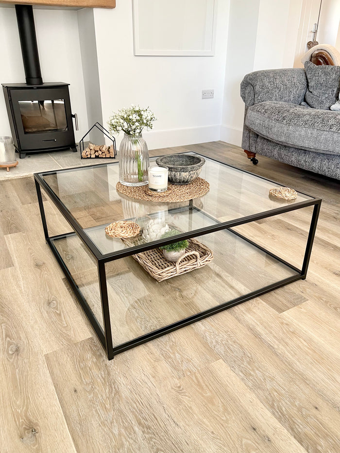 styled metal and glass double shelf coffee table 